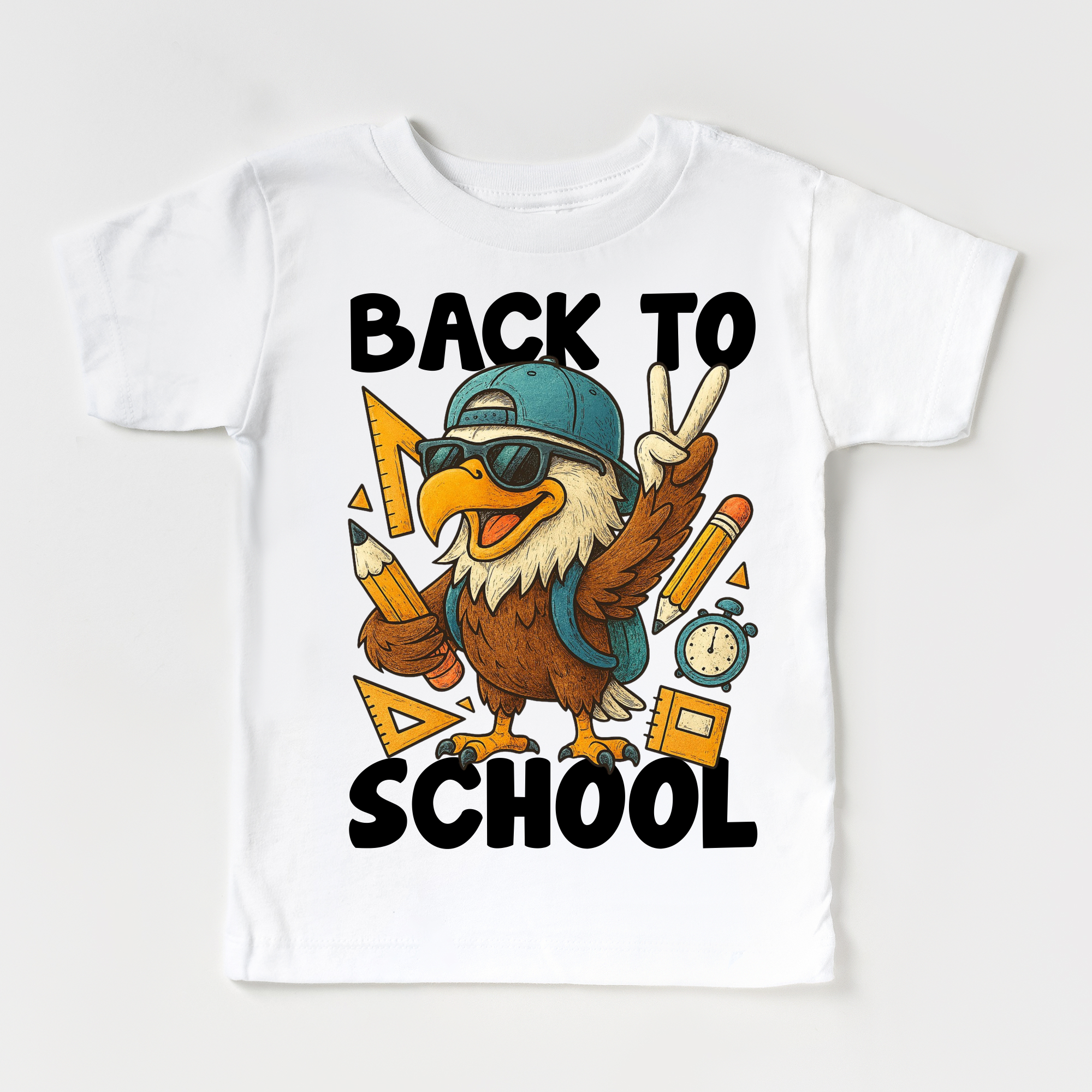 White t-shirt with an eagle graphic and 'Back to School' text on a white background