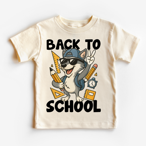 Children's t-shirt with a cartoon dog wearing sunglasses, a cap, and backpack, holding pencils and a ruler with 'Back to School' text.