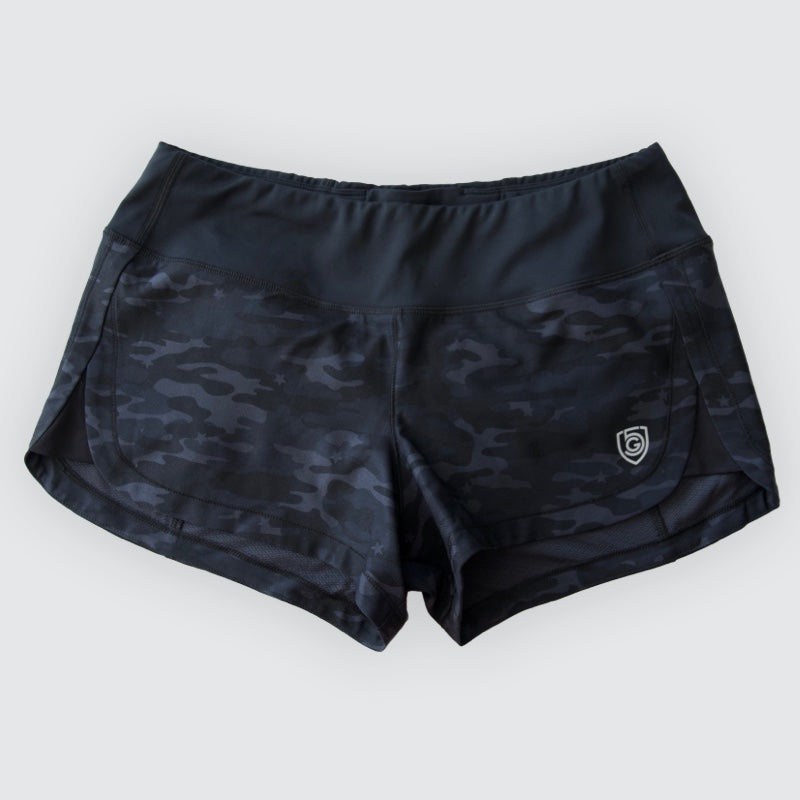 Black camouflage shorts on a white background