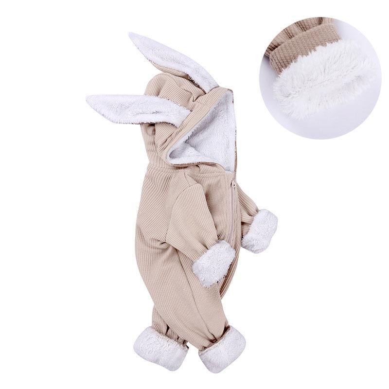 Beige baby onesie with bunny ears and feet on a white background