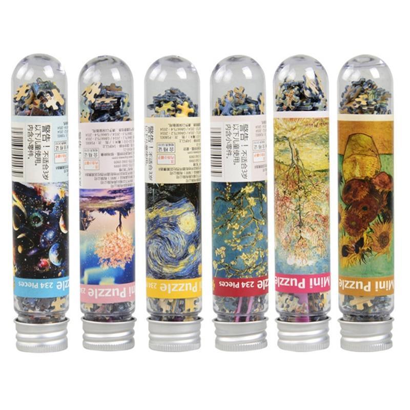 Set of six cylindrical puzzle containers with artistic designs on labels.