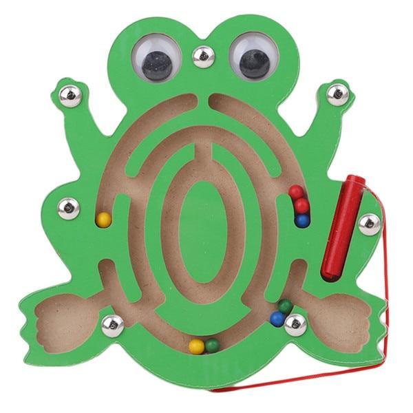 Frog-shaped maze toy with colorful beads on a white background