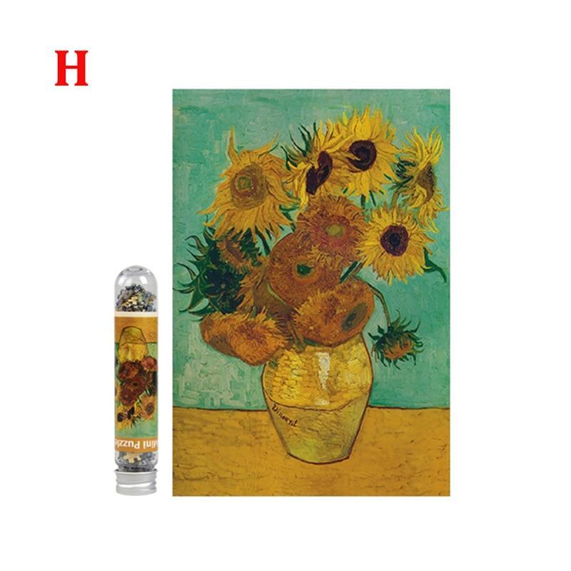 Vase with sunflowers painting and a cylindrical product with a similar design on a white background