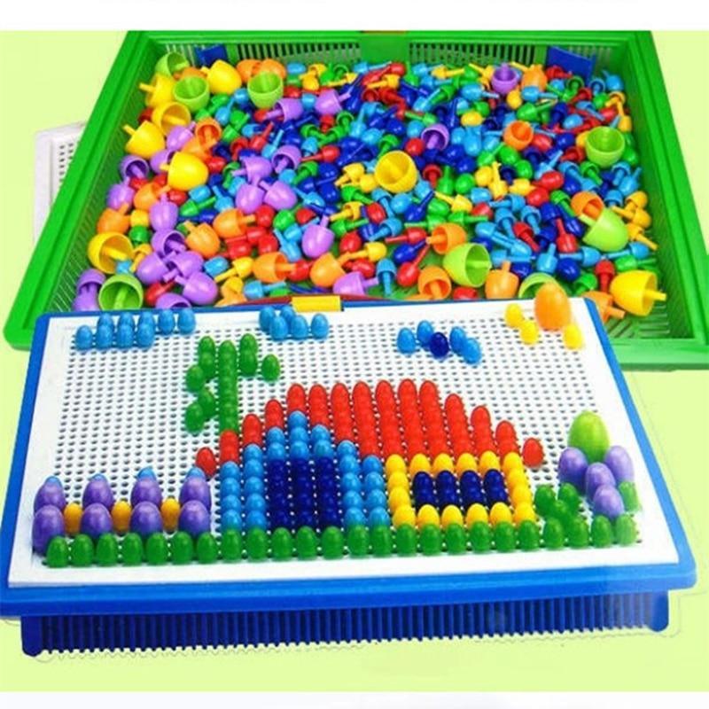 Colorful building block set with a pegboard on a green background