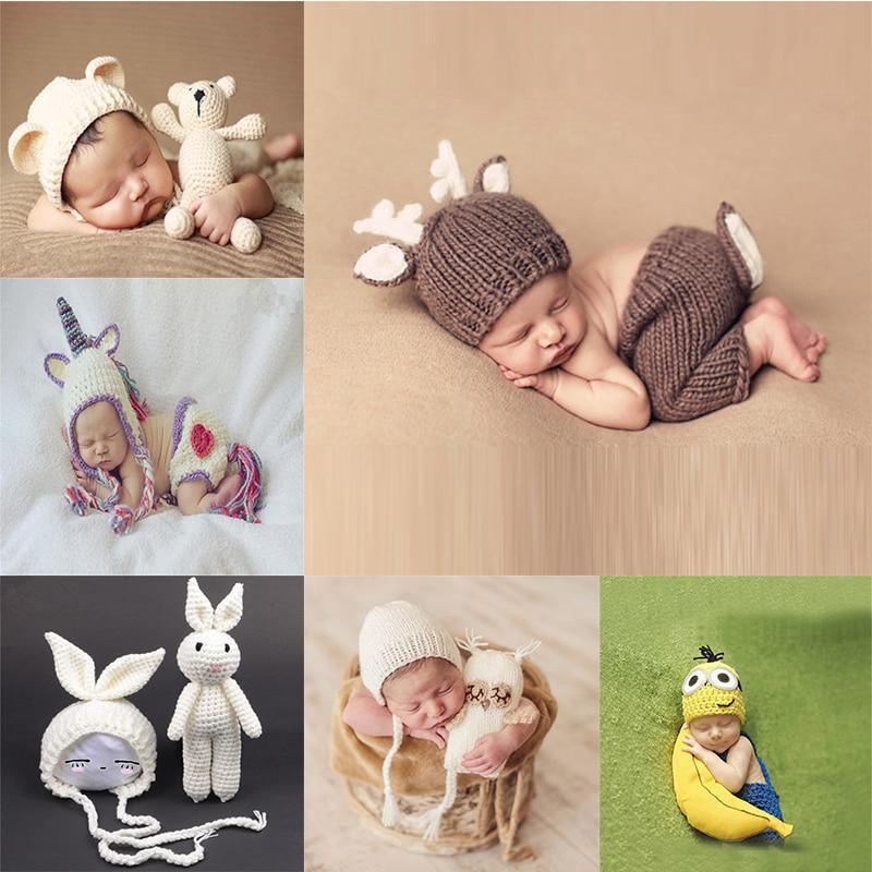 Collage of babies wearing animal-themed hats and outfits on a neutral background