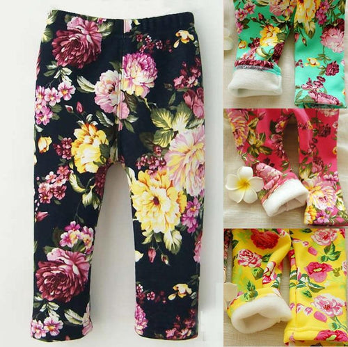 Floral patterned leggings in various colors on a white background