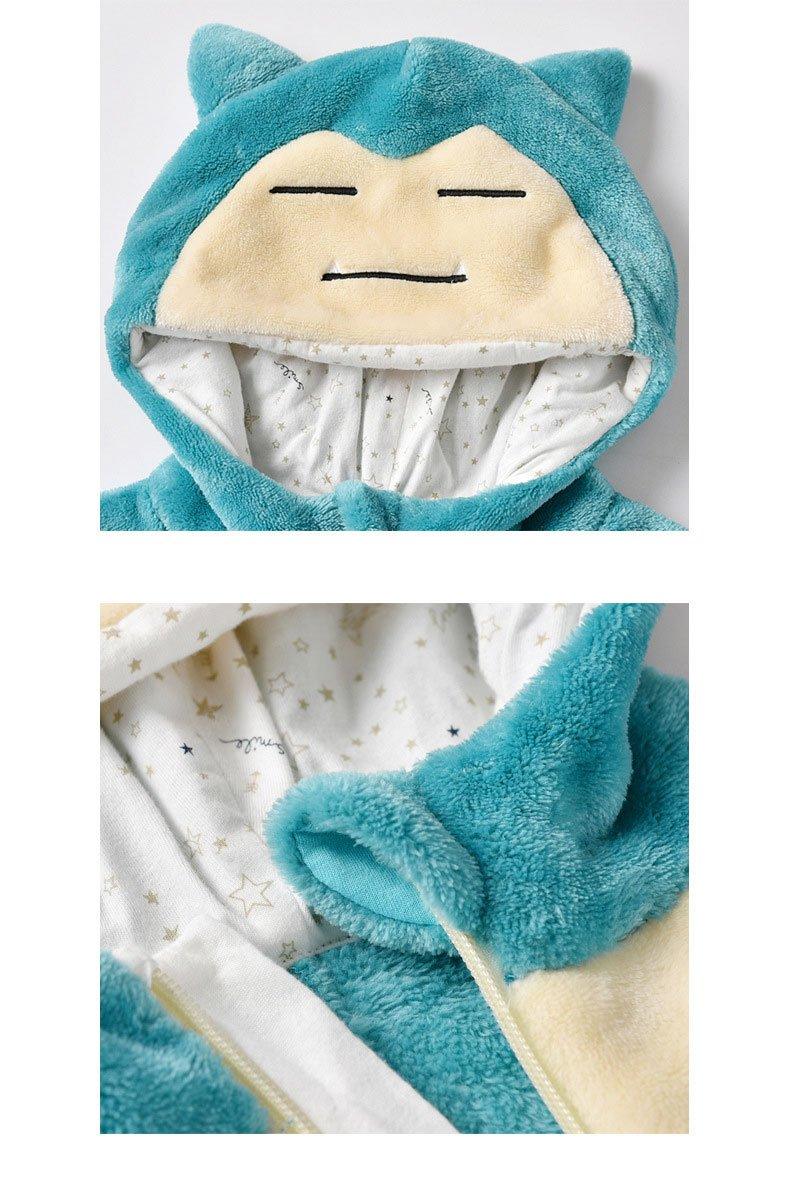 Children's onesie with blue hood and ears, resembling a cartoon character, on a white background.