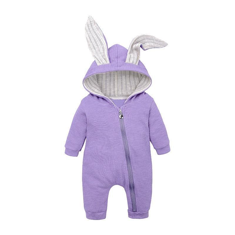 Purple baby onesie with bunny ears on a white background