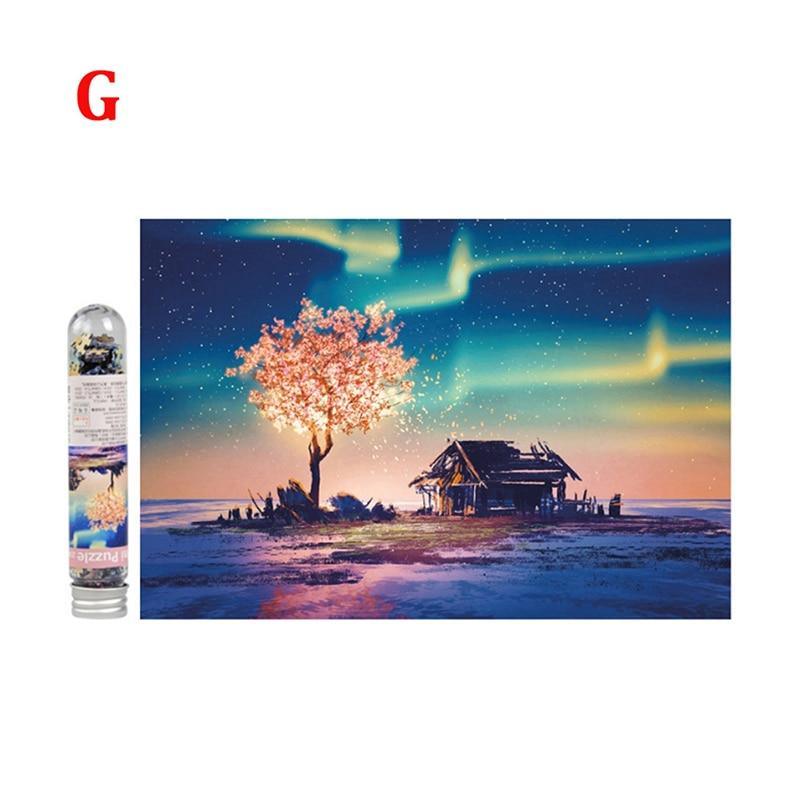 Scenic artwork with a tree and house under a starry sky, next to a product packaging.