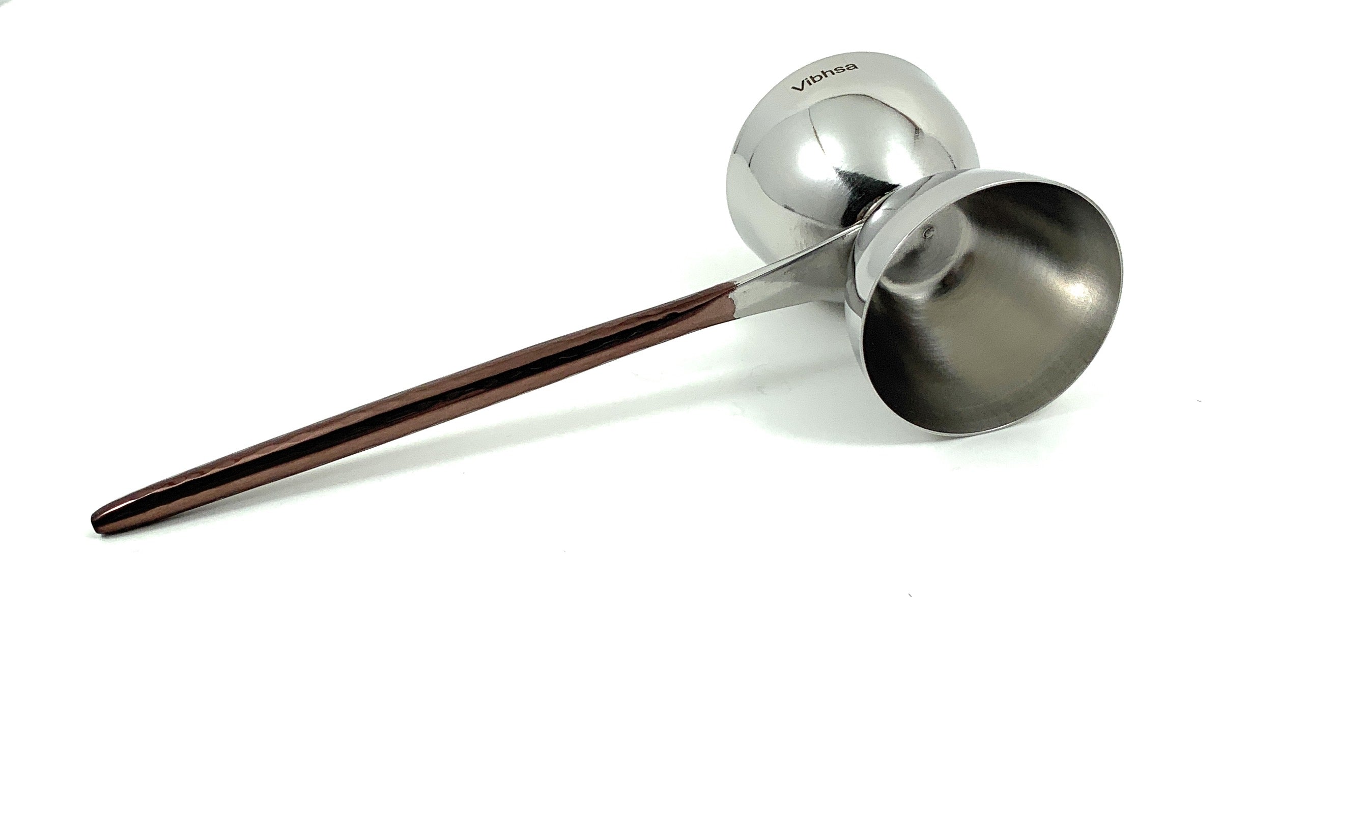 Metallic ladle on a white background