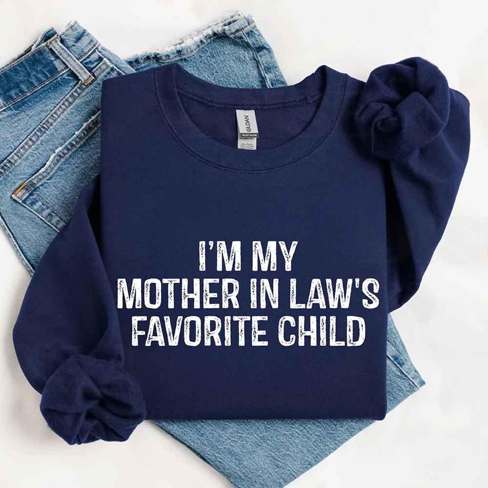 Navy sweatshirt with 'I'm my mother in law's favorite child' text on a white background