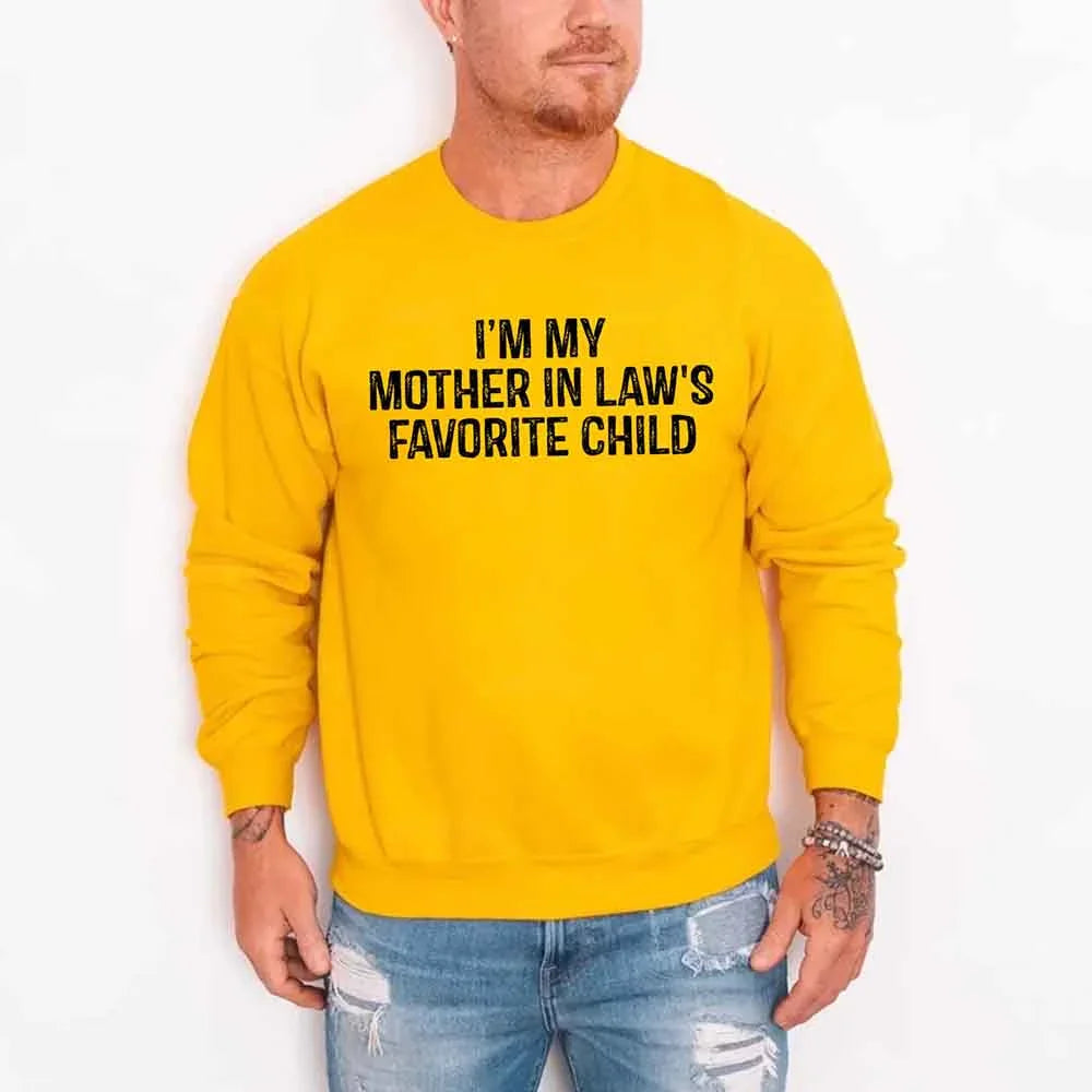 Person wearing a yellow sweatshirt with text on a white background