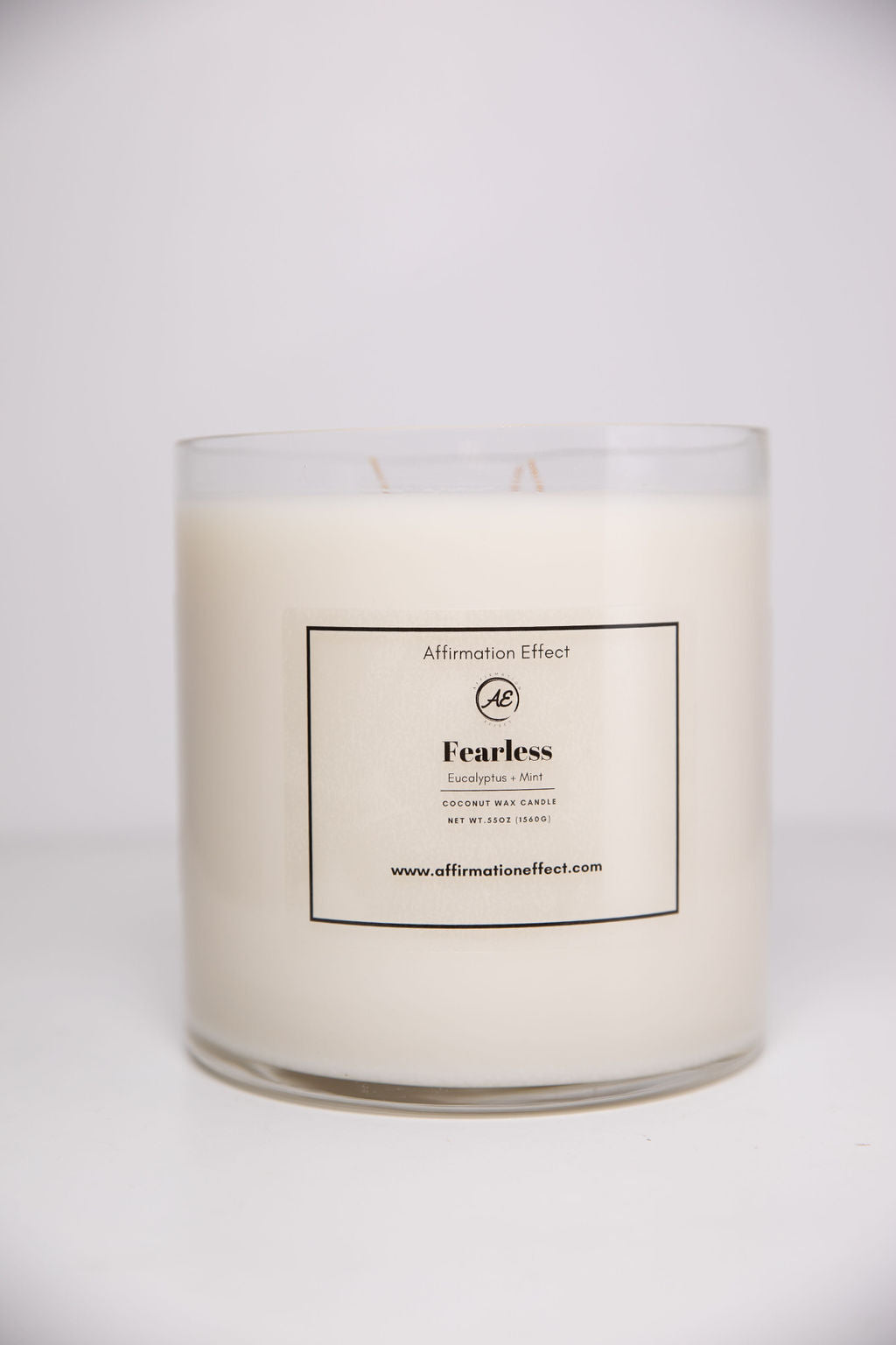 Candle with a label on a white background