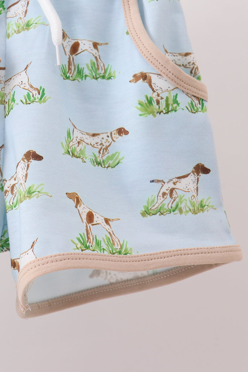 Light blue fabric with dog pattern on a beige background