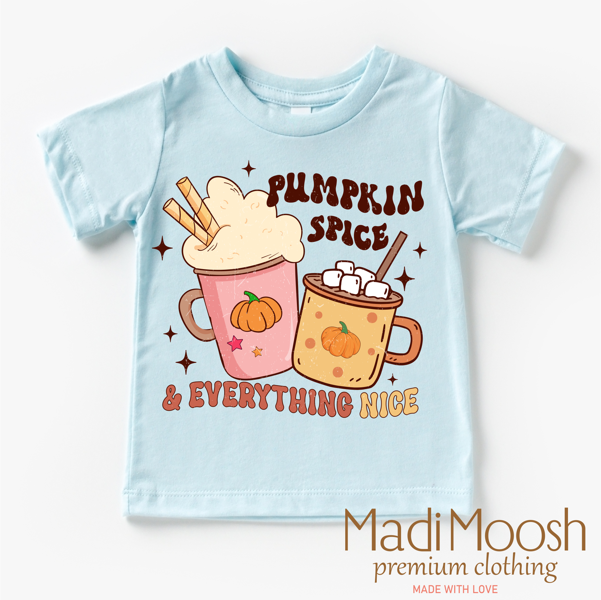 Light blue t-shirt with pumpkin spice and hot chocolate graphic and 'Madi Moosh' branding.