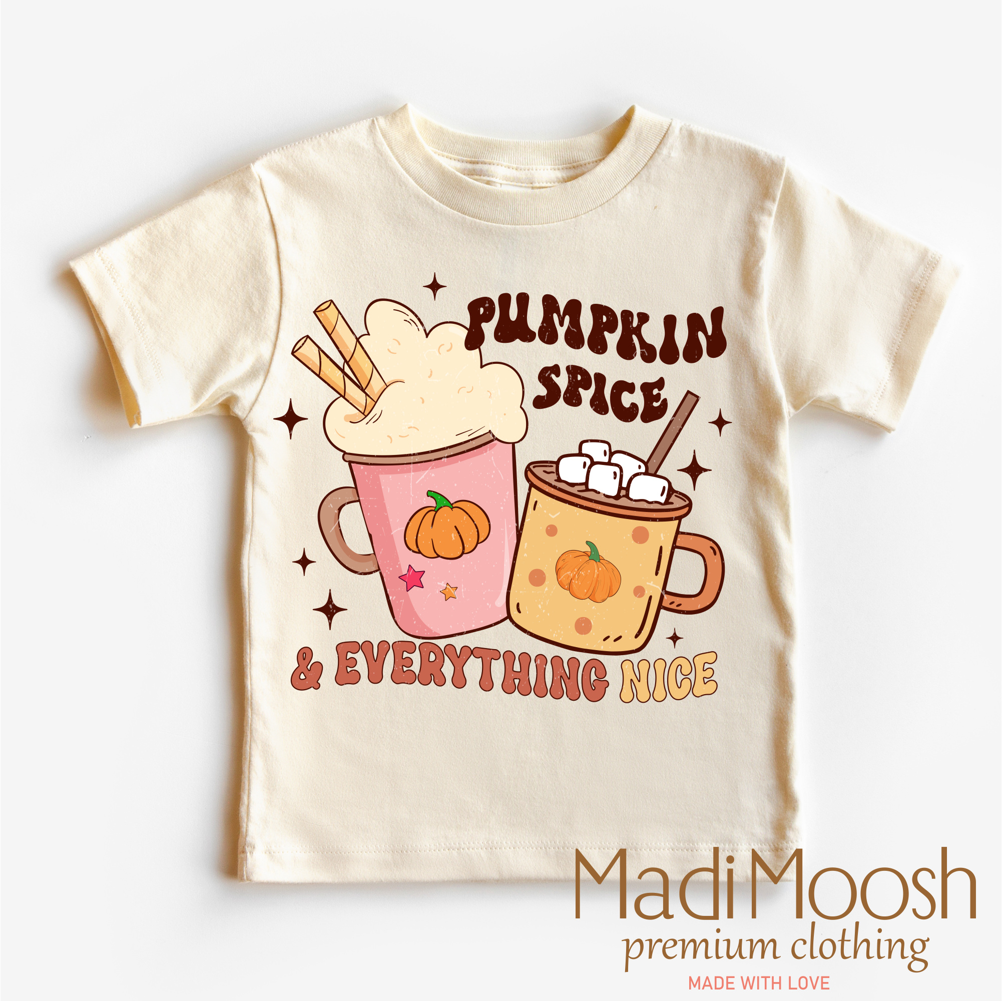 Beige t-shirt with pumpkin spice and hot chocolate graphic and 'Madi Moosh' branding.