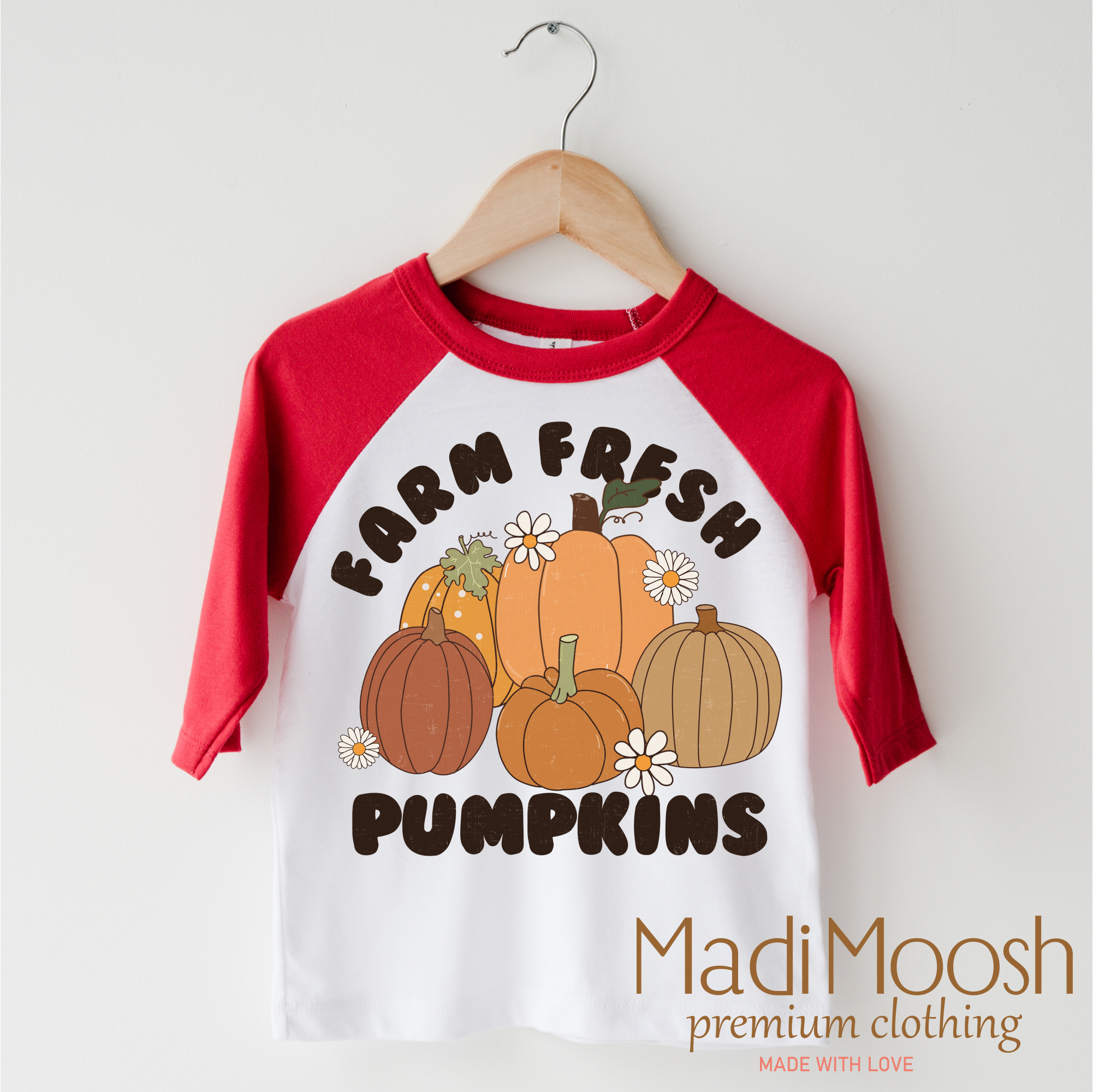 Children's 3/4 sleeve shirt with pumpkins and 'Farm Fresh Pumpkins' text, brand 'Madi Moosh' visible
