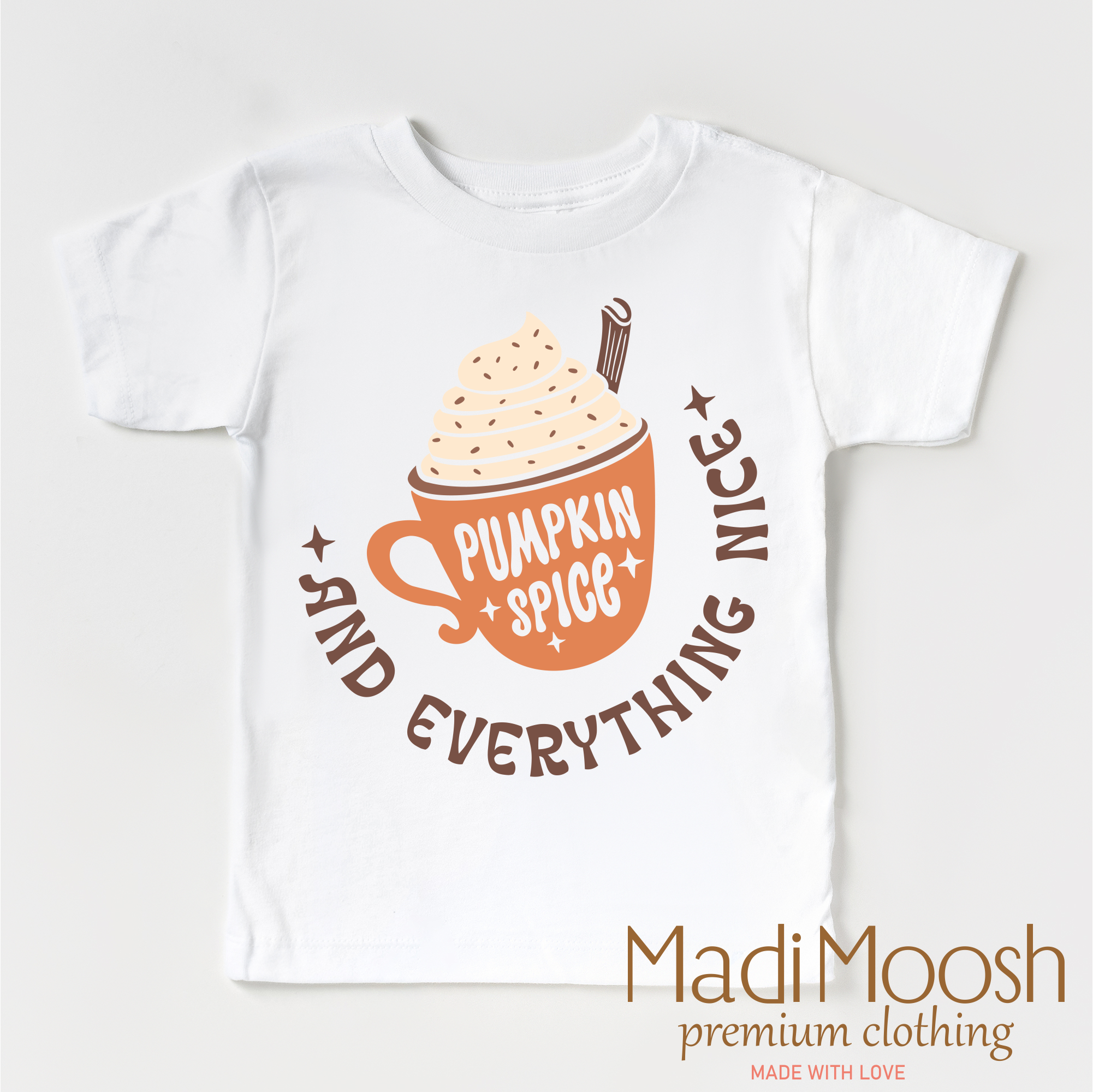 White t-shirt with pumpkin spice latte graphic and text on a white background, branded as Madi Moosh.