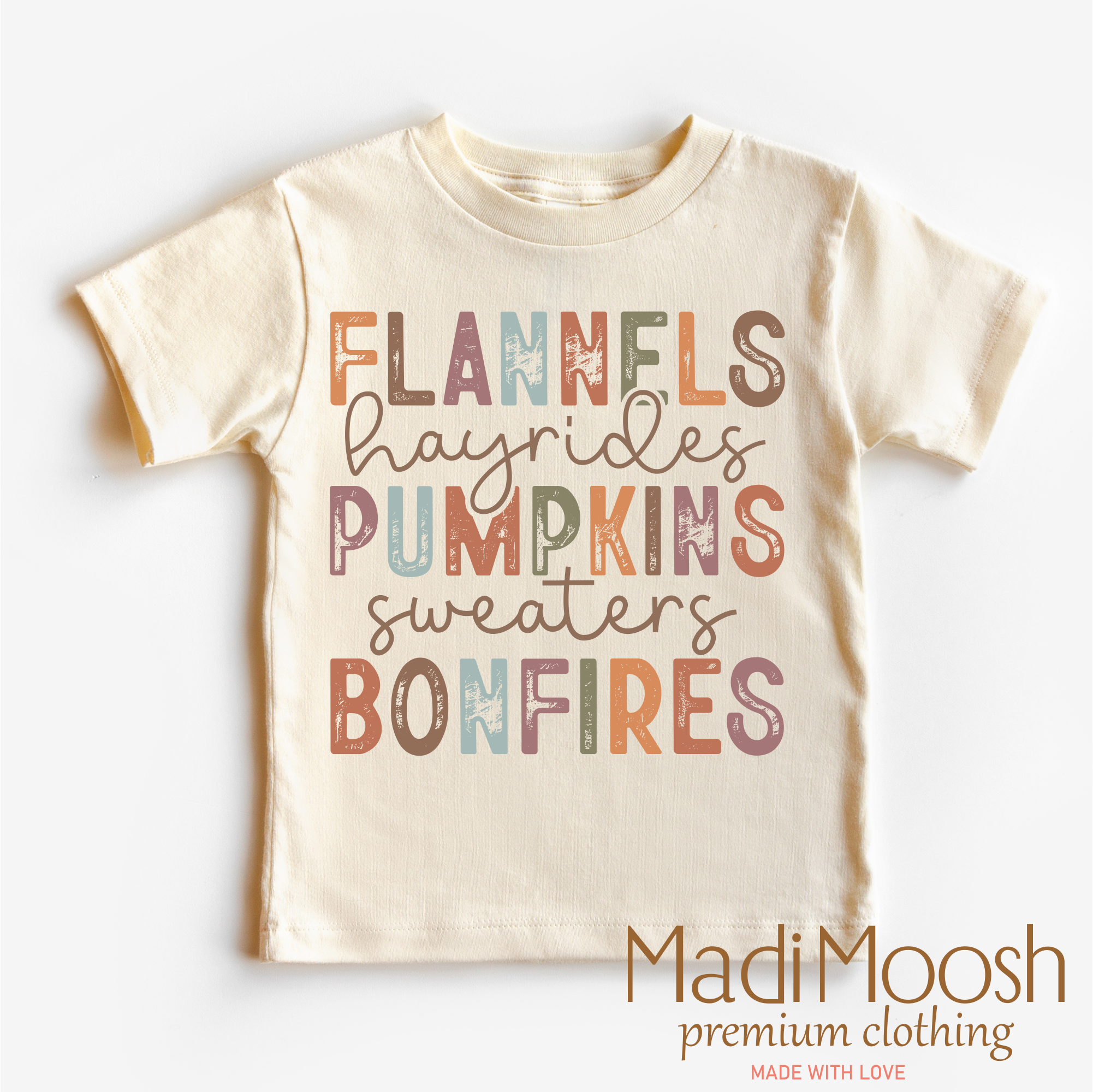 Children's t-shirt with autumn-themed text on a white background, featuring the brand 'Madi Moosh'.