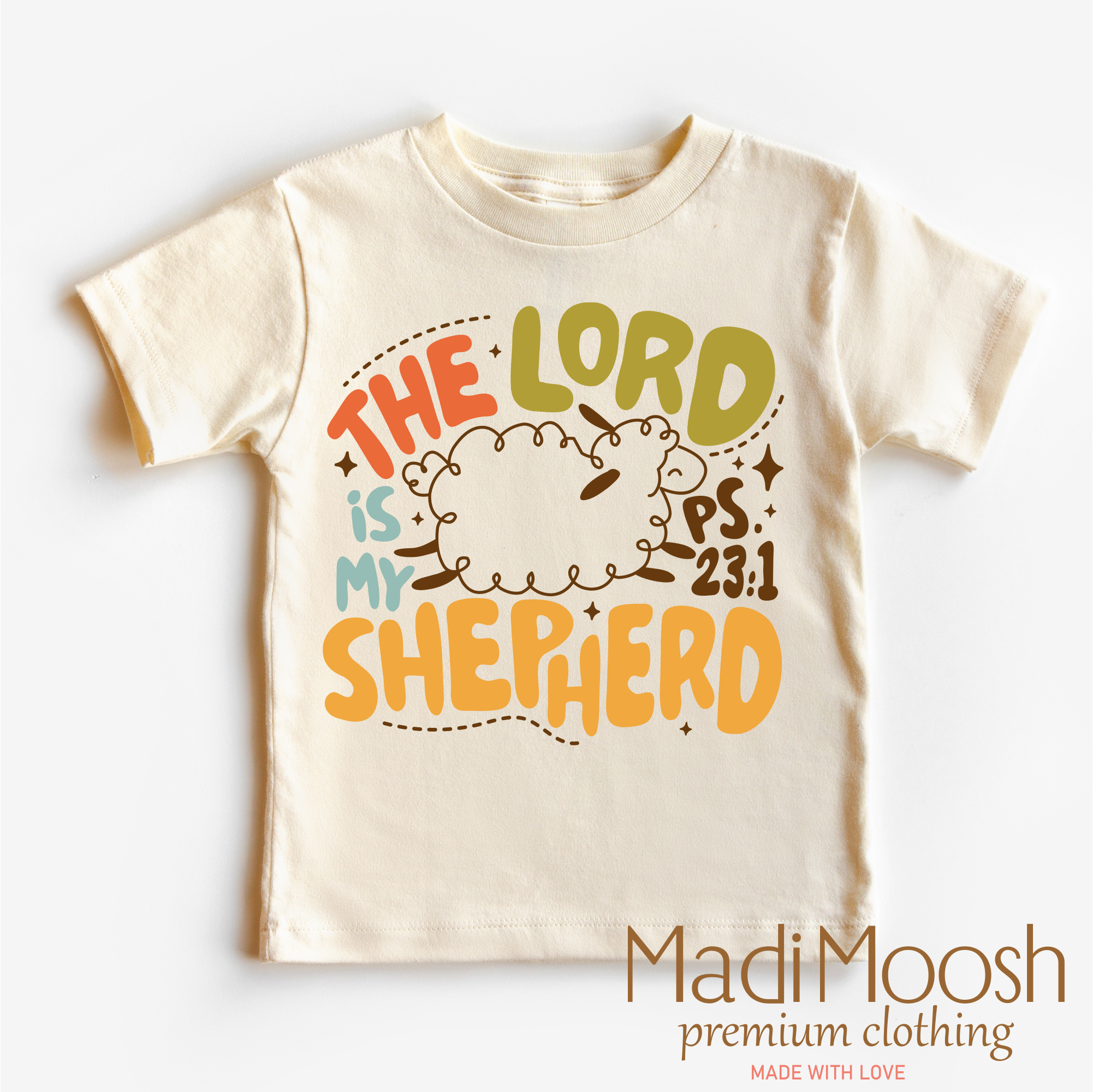 Beige t-shirt with 'The Lord is my Shepherd' text on a white background, branded as Madi Moosh.