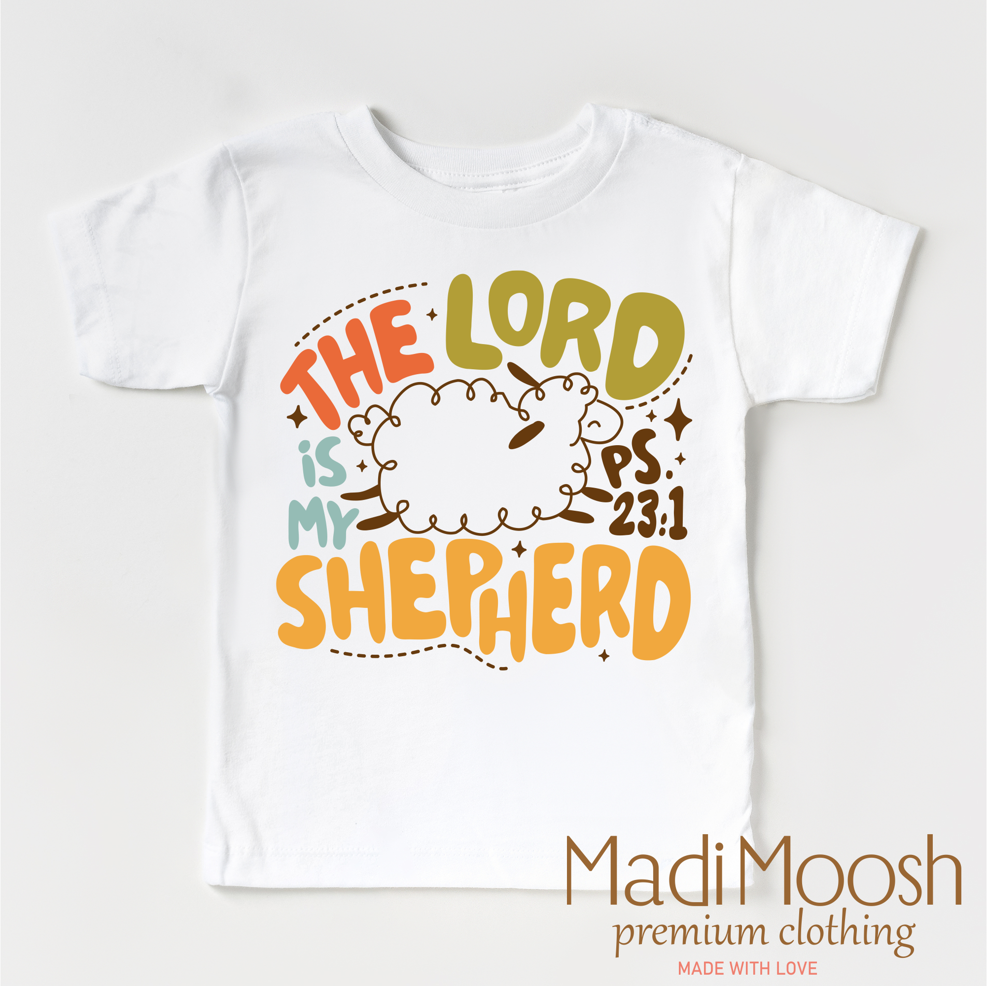 White t-shirt with 'The Lord is my Shepherd' text and Madi Moosh branding on a white background