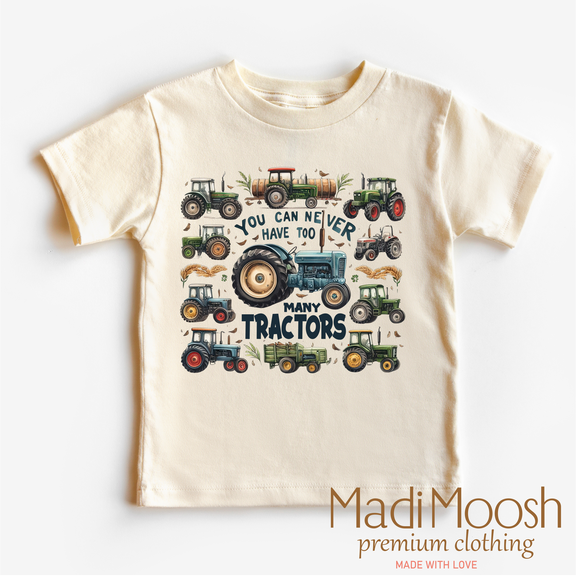 Children's t-shirt with tractor design and 'Madi Moosh' branding on a white background