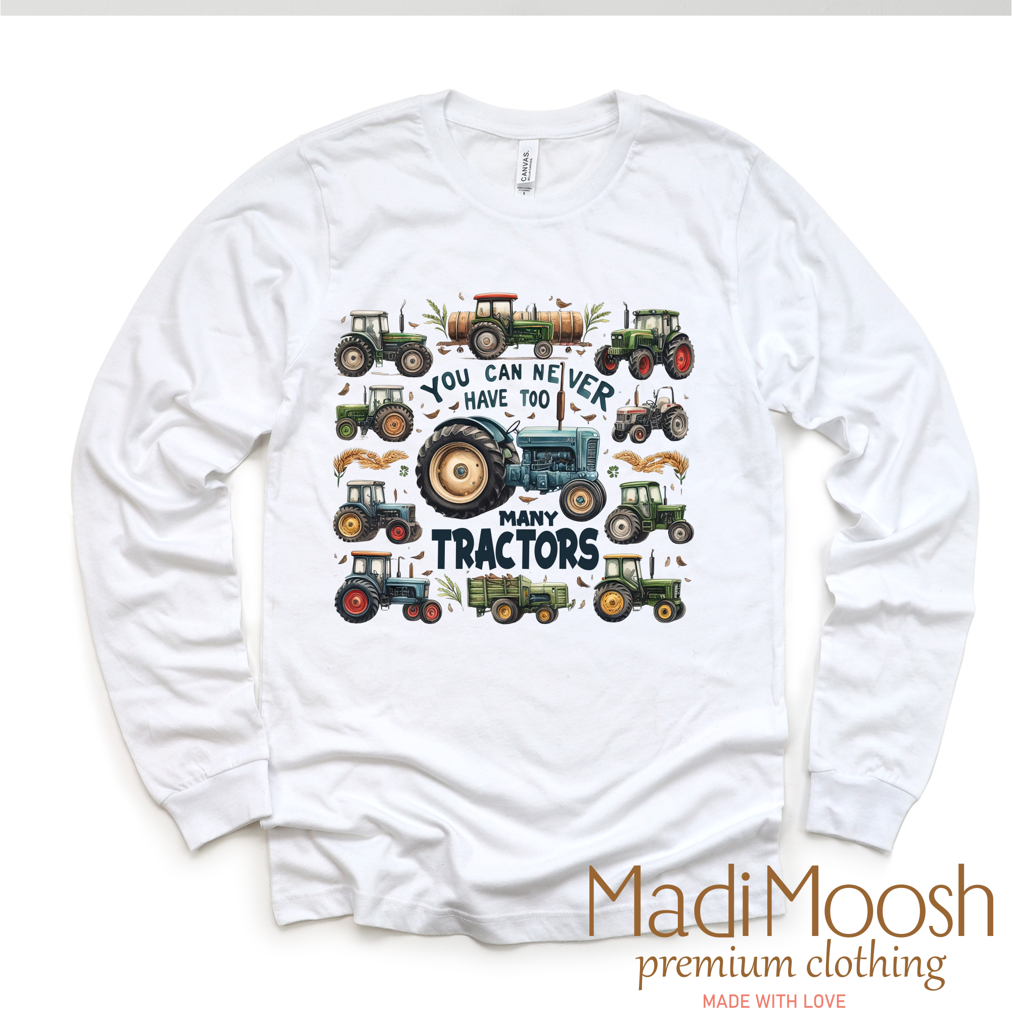 White long sleeve shirt with tractor design and 'Madi Moosh' branding on a white background