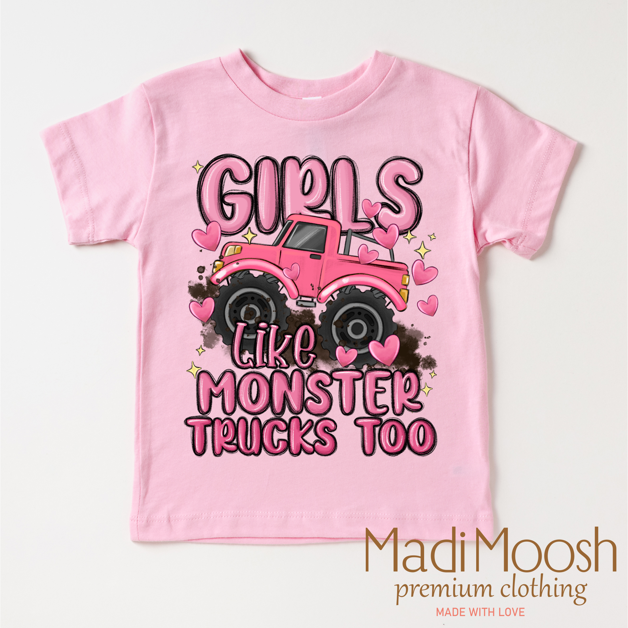 Pink children's t-shirt with a monster truck graphic and text on a white background