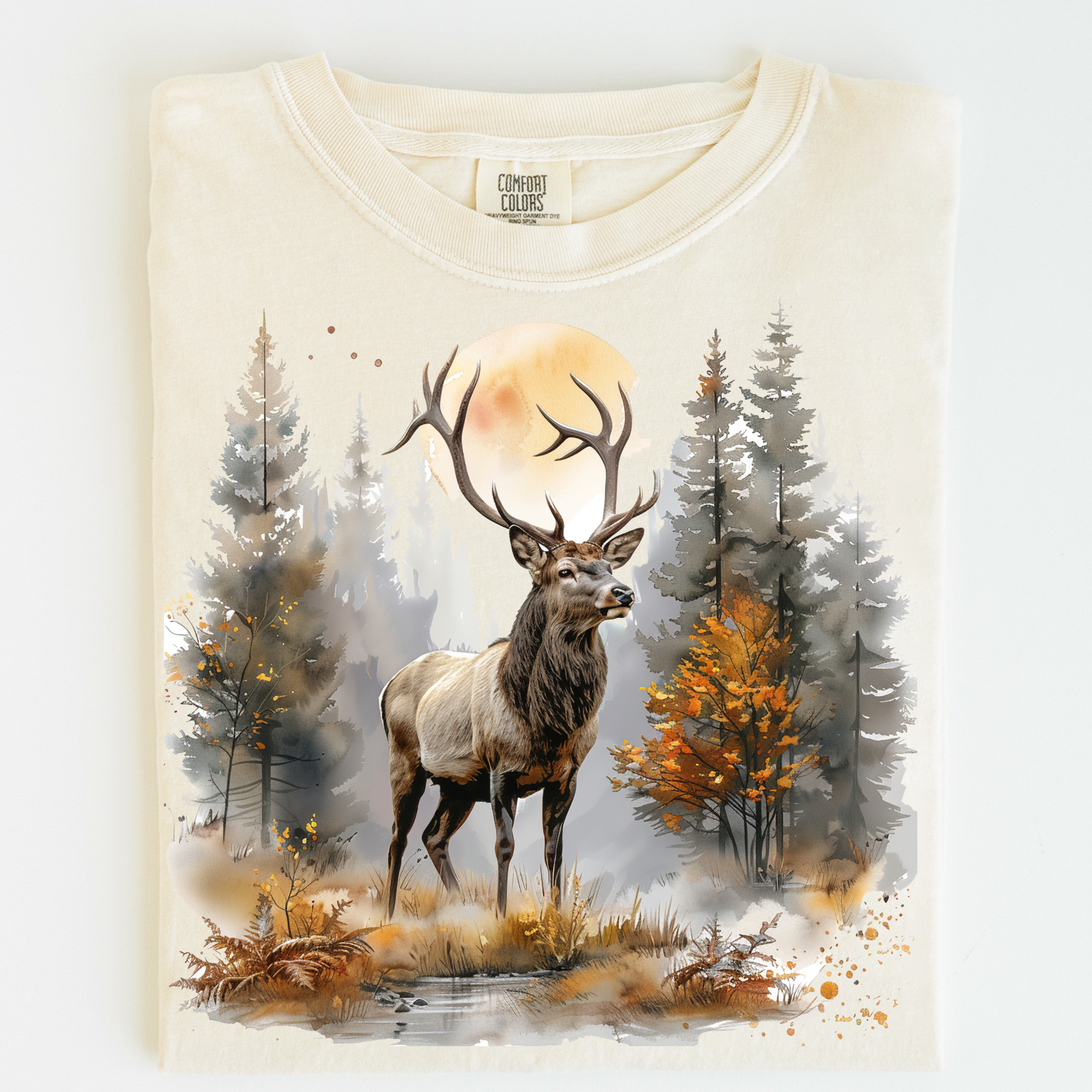 T-shirt with a deer and forest design on a plain background