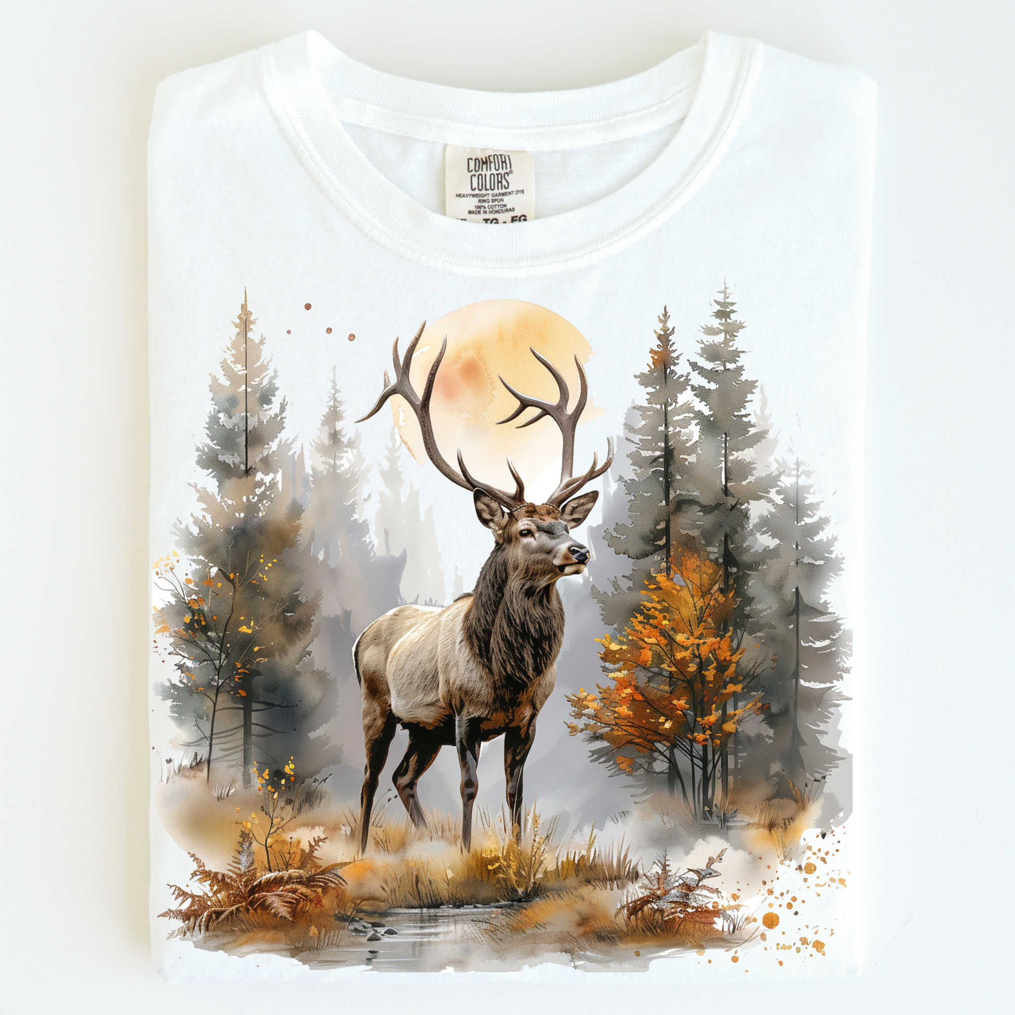 White t-shirt with a deer and forest design on a white background