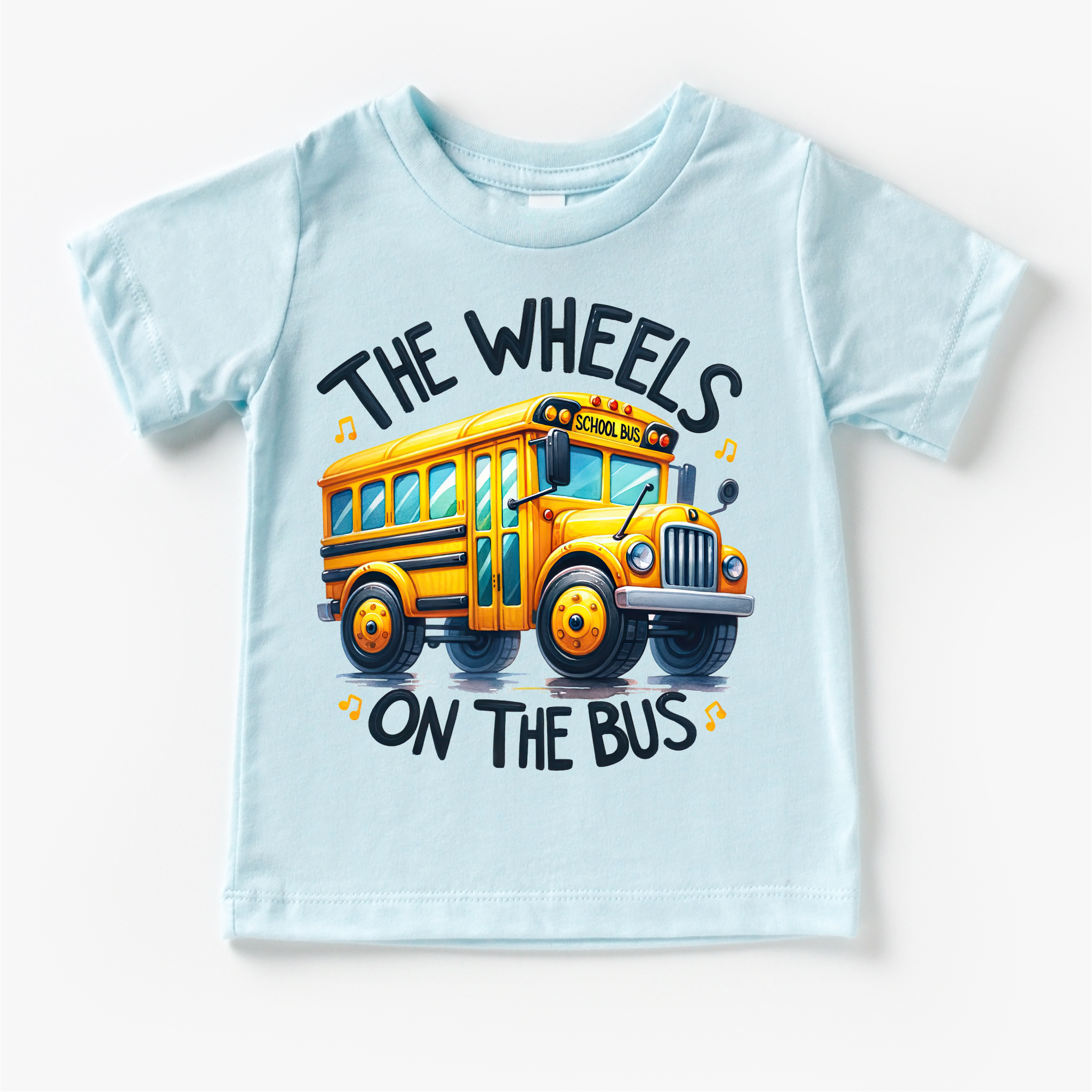 Light blue t-shirt with a yellow school bus graphic and text on a white background