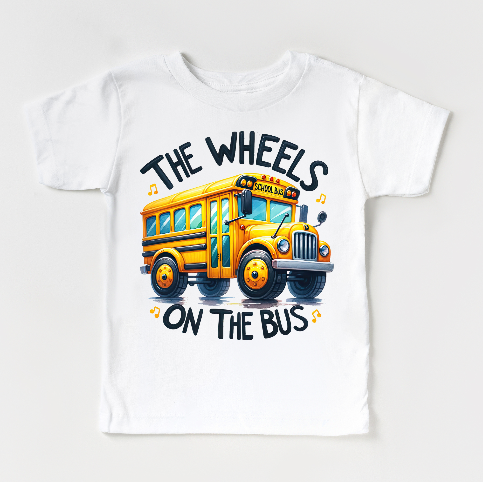 White t-shirt with a yellow school bus graphic and text on a white background