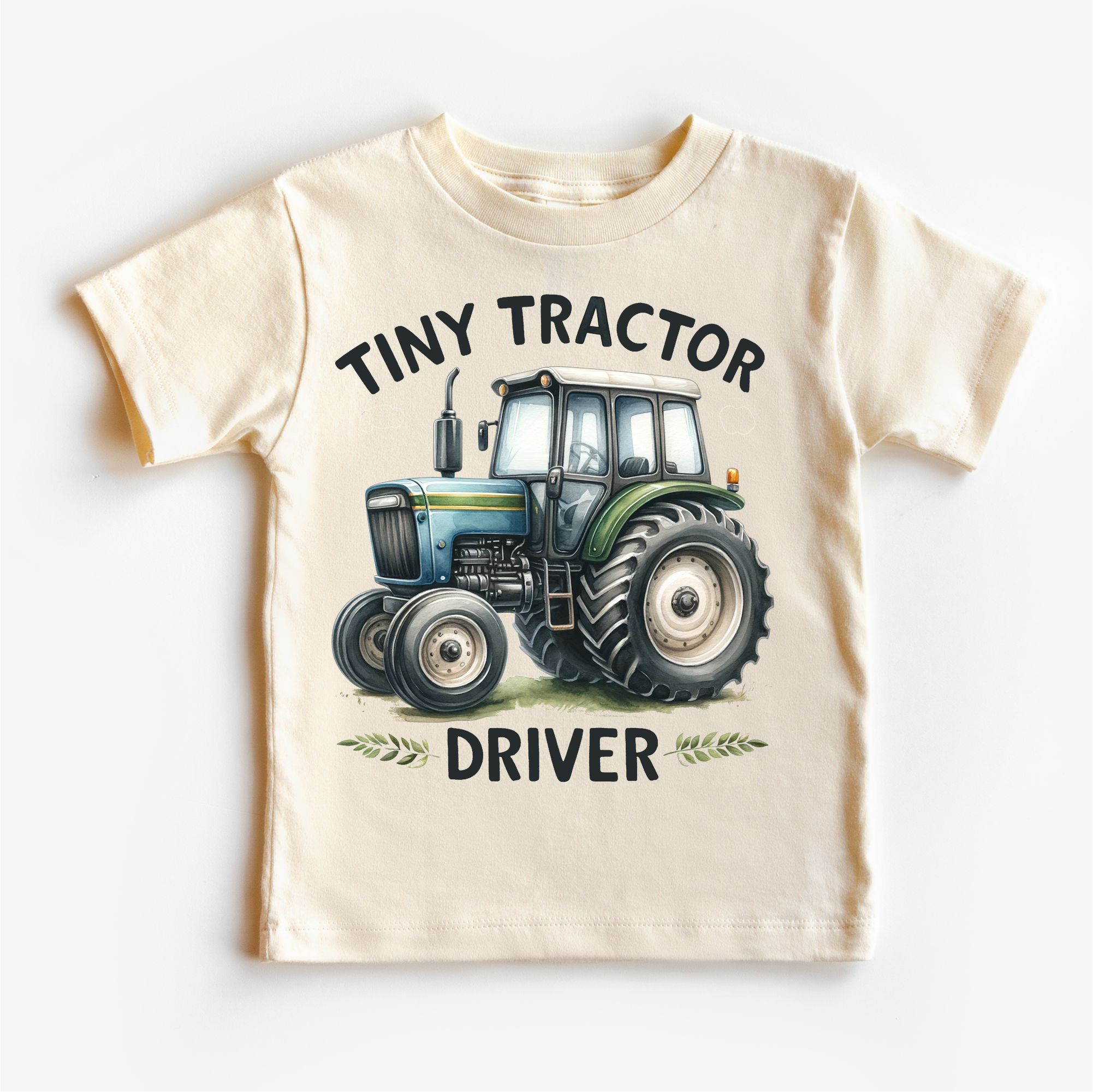Children's t-shirt with a tractor graphic and text on a white background