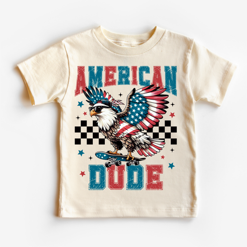 Beige t-shirt with an eagle graphic and 'American Dude' text on a white background