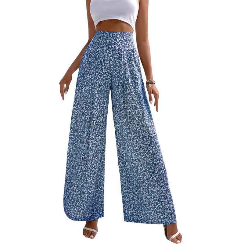 Blue floral wide-leg pants worn by a person on a white background