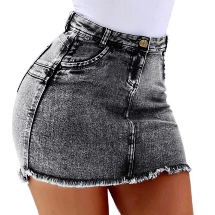 Black denim skirt worn by a person on a white background