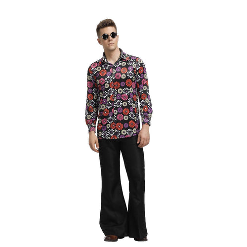 Man wearing a colorful floral shirt and black pants on a white background