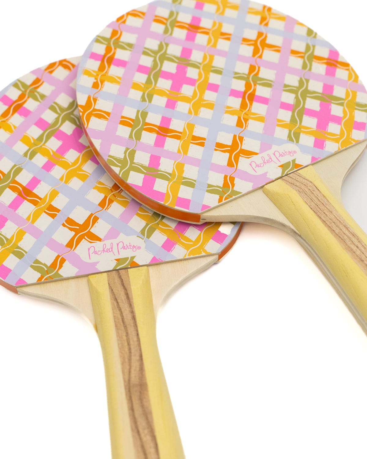 Two colorful ping pong paddle sets with a white background