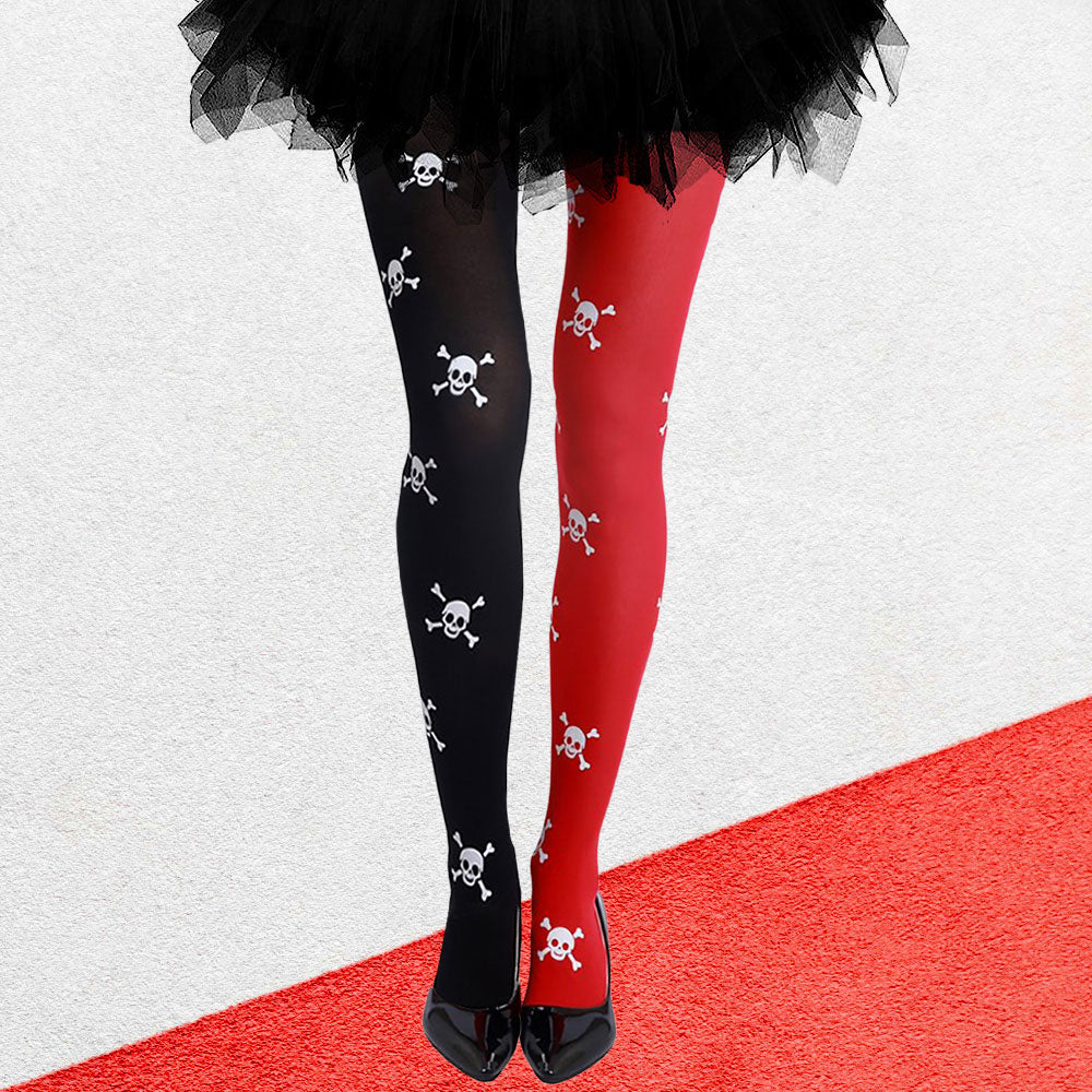 Black and red tights with skull patterns worn by a person on a white background.