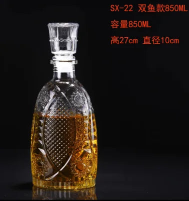 Decorative glass bottle with liquid, featuring text on a black background