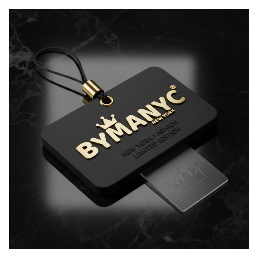 Black and gold BYMANYC New York product with a dark background