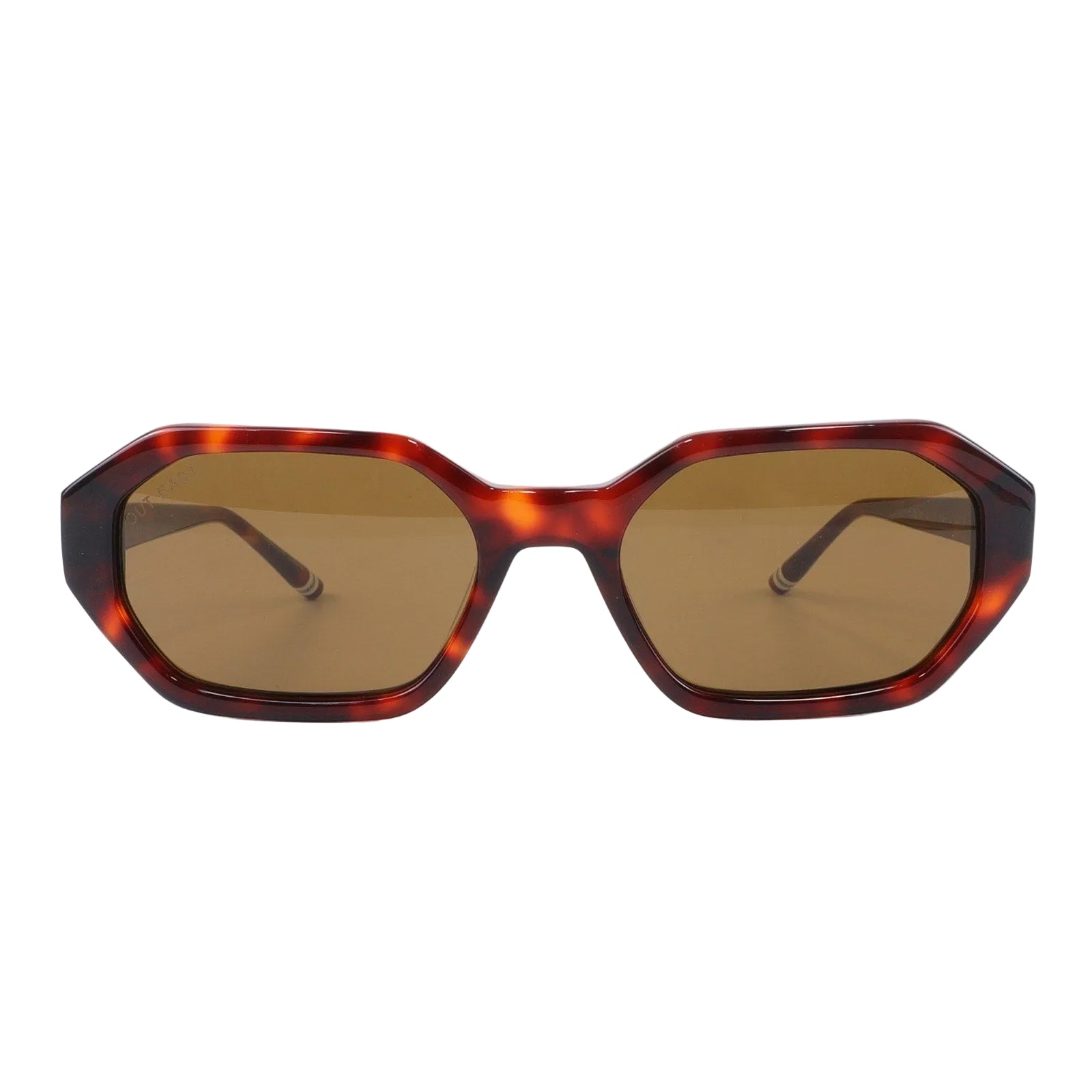 Sunglasses with tortoiseshell frame and brown lenses on a white background