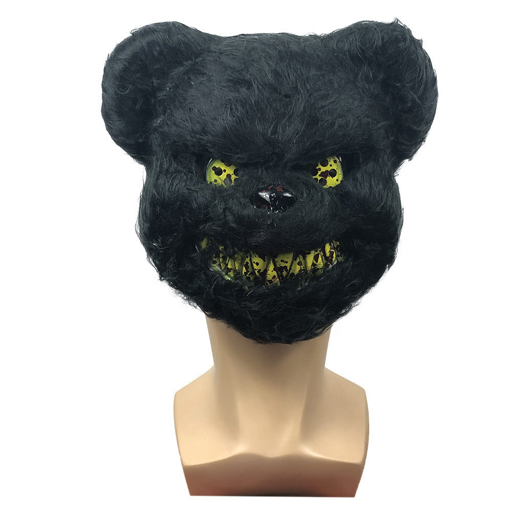 Black furry mask with yellow eyes and teeth on a mannequin head against a white background