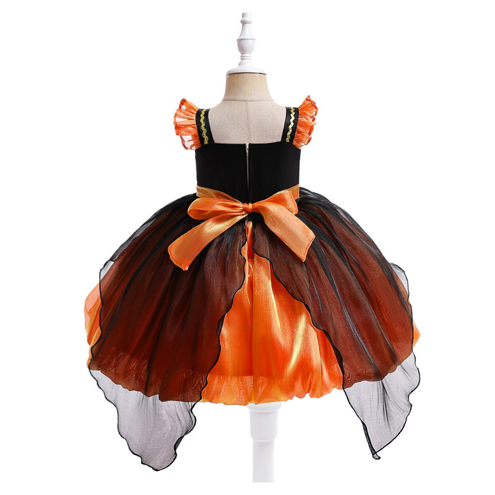 Children's Halloween dress on a mannequin with black, orange, and white colors.