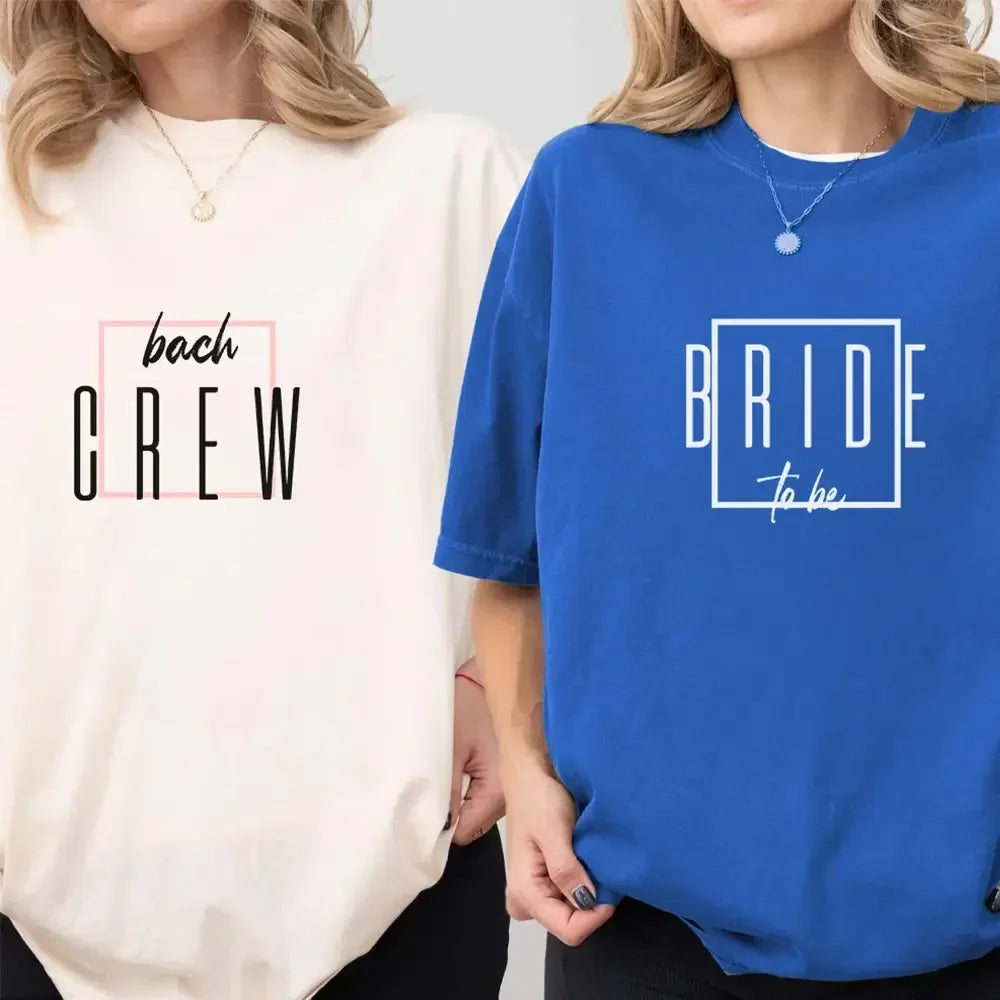 Two shirts with 'bach CREW' and 'BRIDE to be' text on a plain background