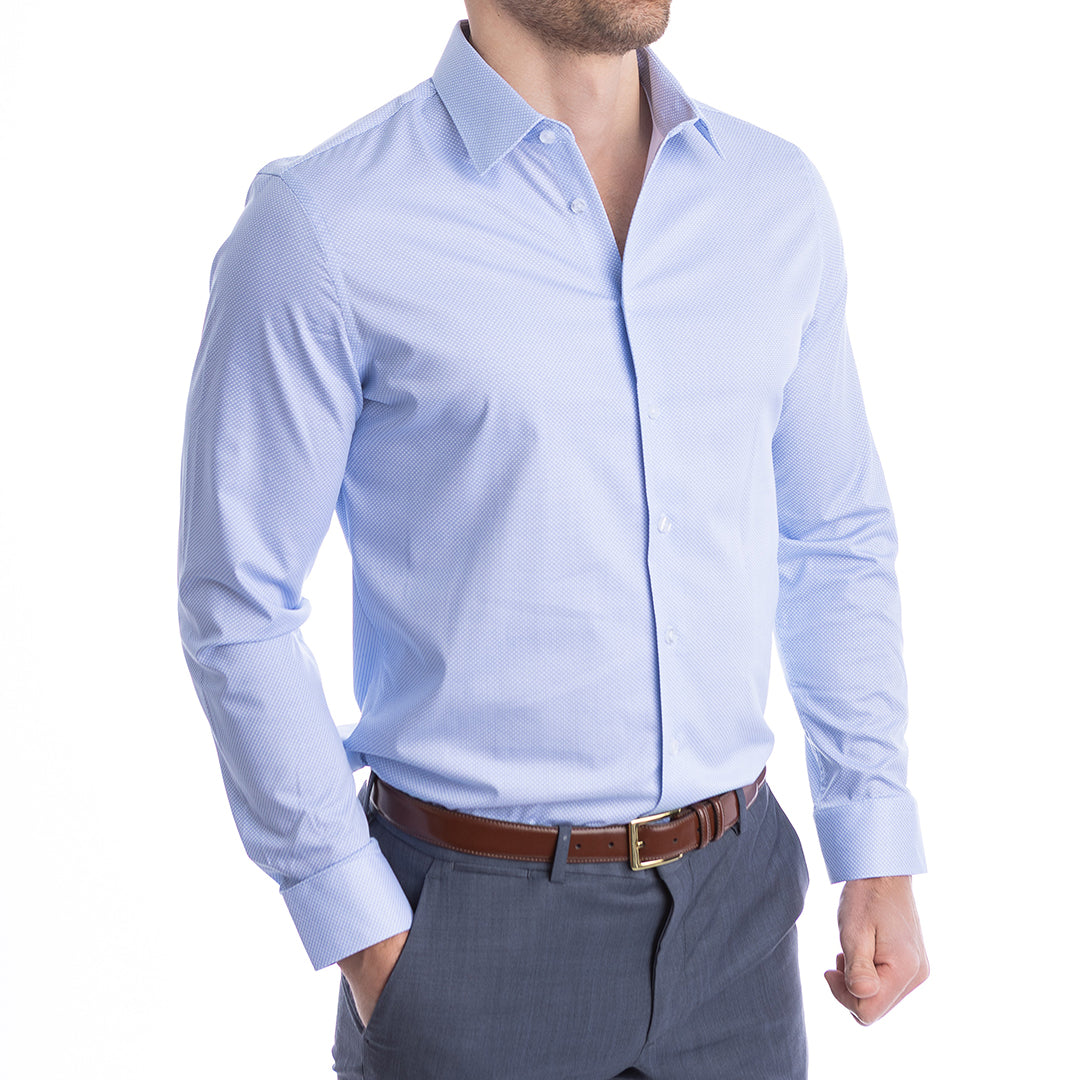 Light blue dress shirt worn by a person on a white background