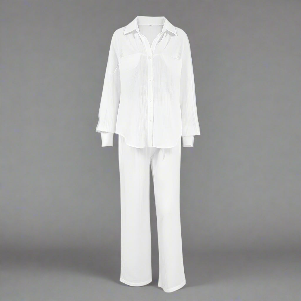 White shirt and pants set on a gray background