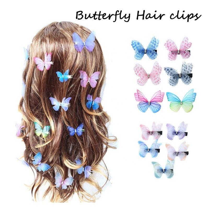 Butterfly hair clips on a person's hair with additional clips displayed.