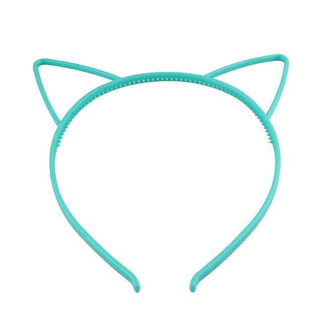 Turquoise cat ear headband on a white background
