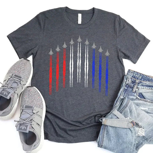 Gray t-shirt with graphic design, sneakers, and denim shorts on a white background